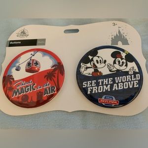 Pair of buttons of Disneys Skyliner